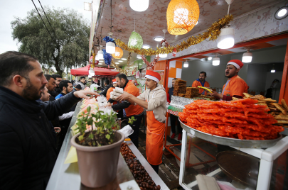تشتهر مدينة بوفاريك ببيع حلوى الزلابية الخاصة بشهر رمضان (الصورة: Getty)